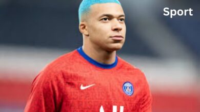 Mbappé cheveux rose